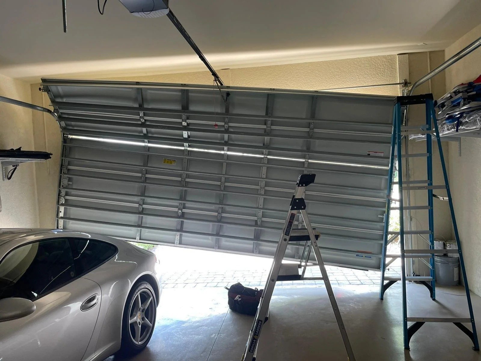 Off-track garage door repair Alpharetta
